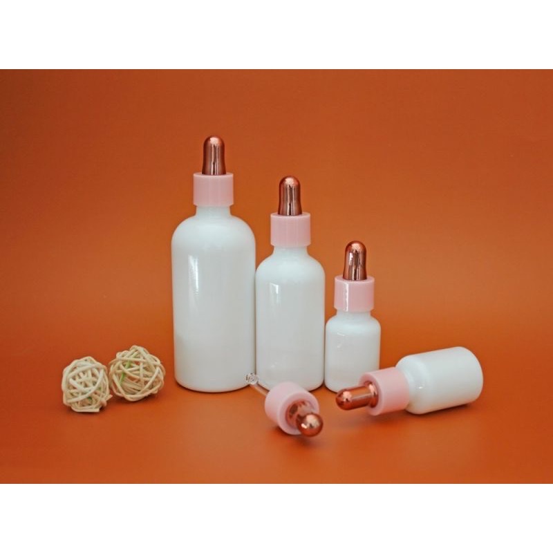 Thumbnail: Milky white opal dropper bottle set with rose-gold droppers.